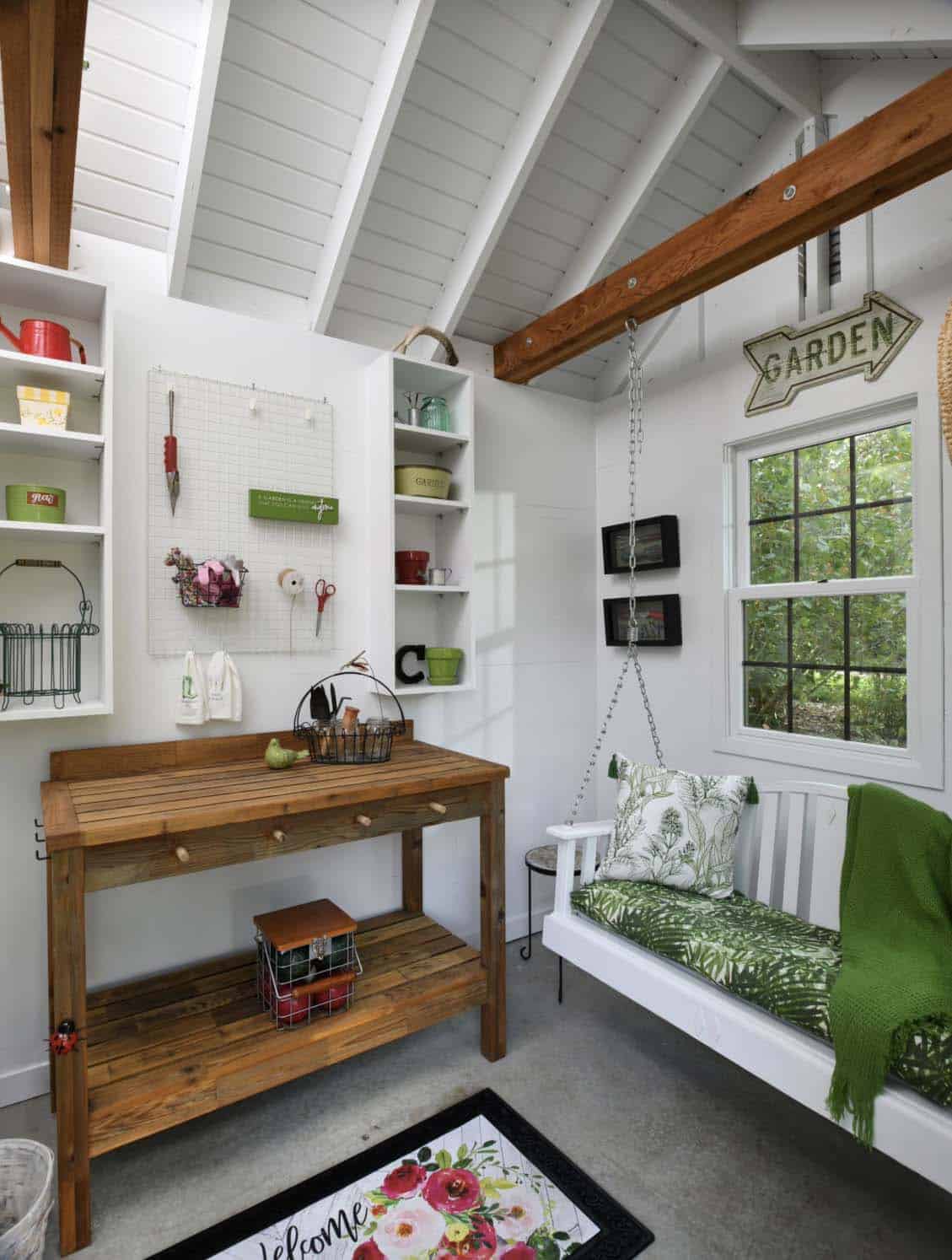 traditional garden shed with a hanging swing