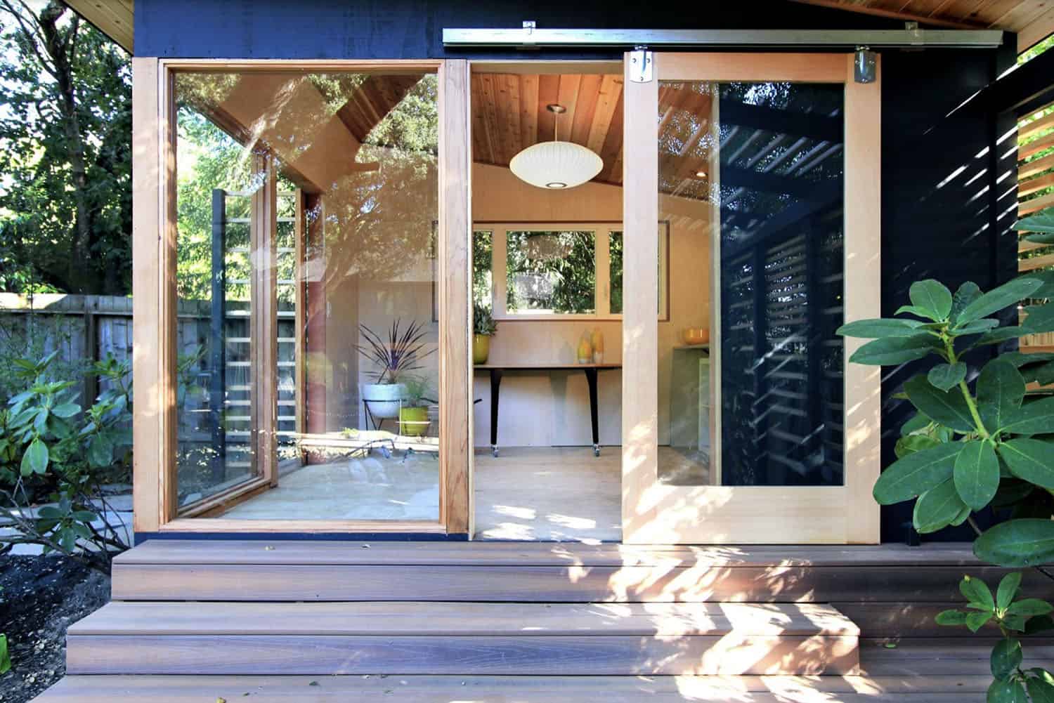 modern shed exterior with sliding barn doors