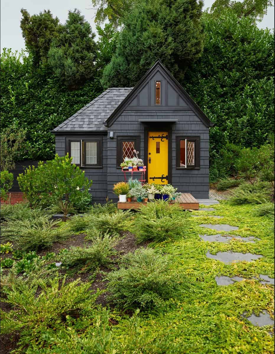 eclectic shed with a stepping stone pathway