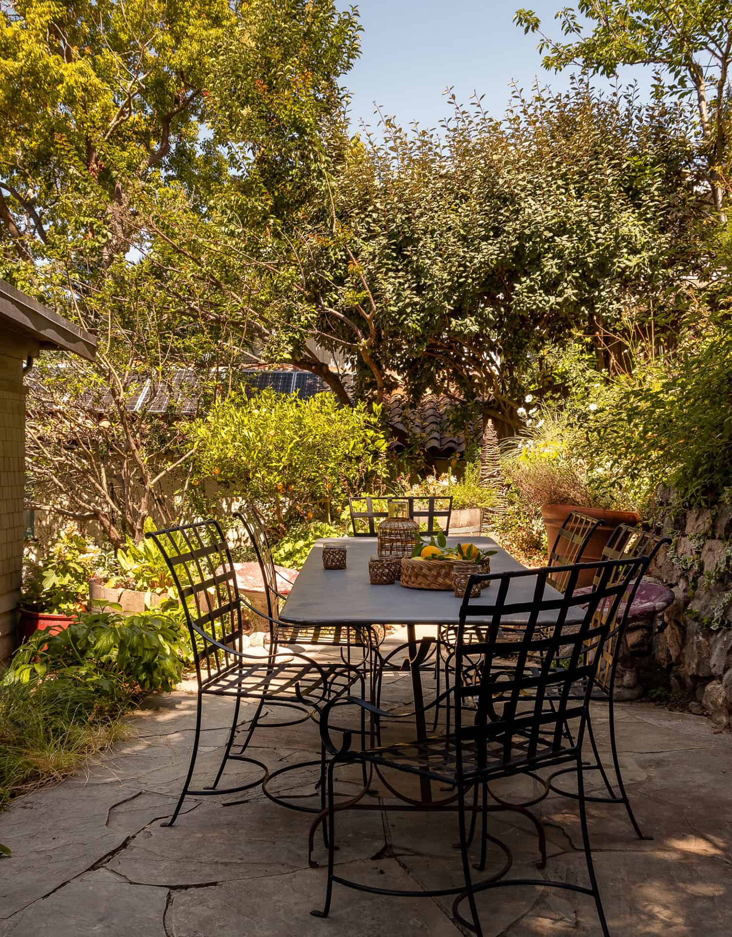 contemporary backyard porch with a dining bistro set