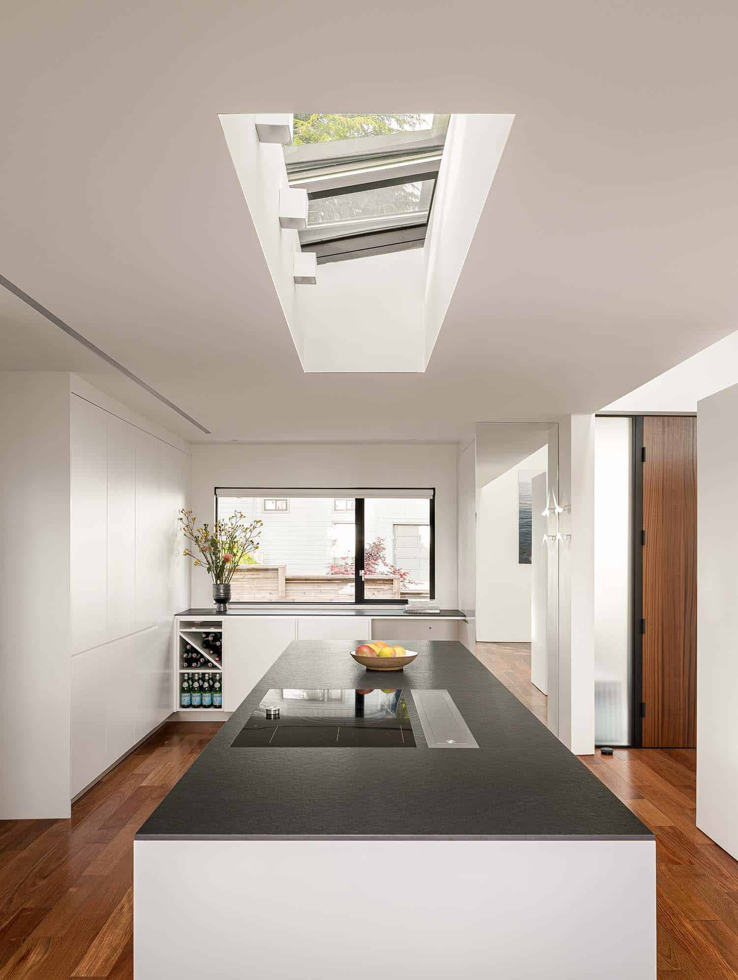modern kitchen with a large skylight