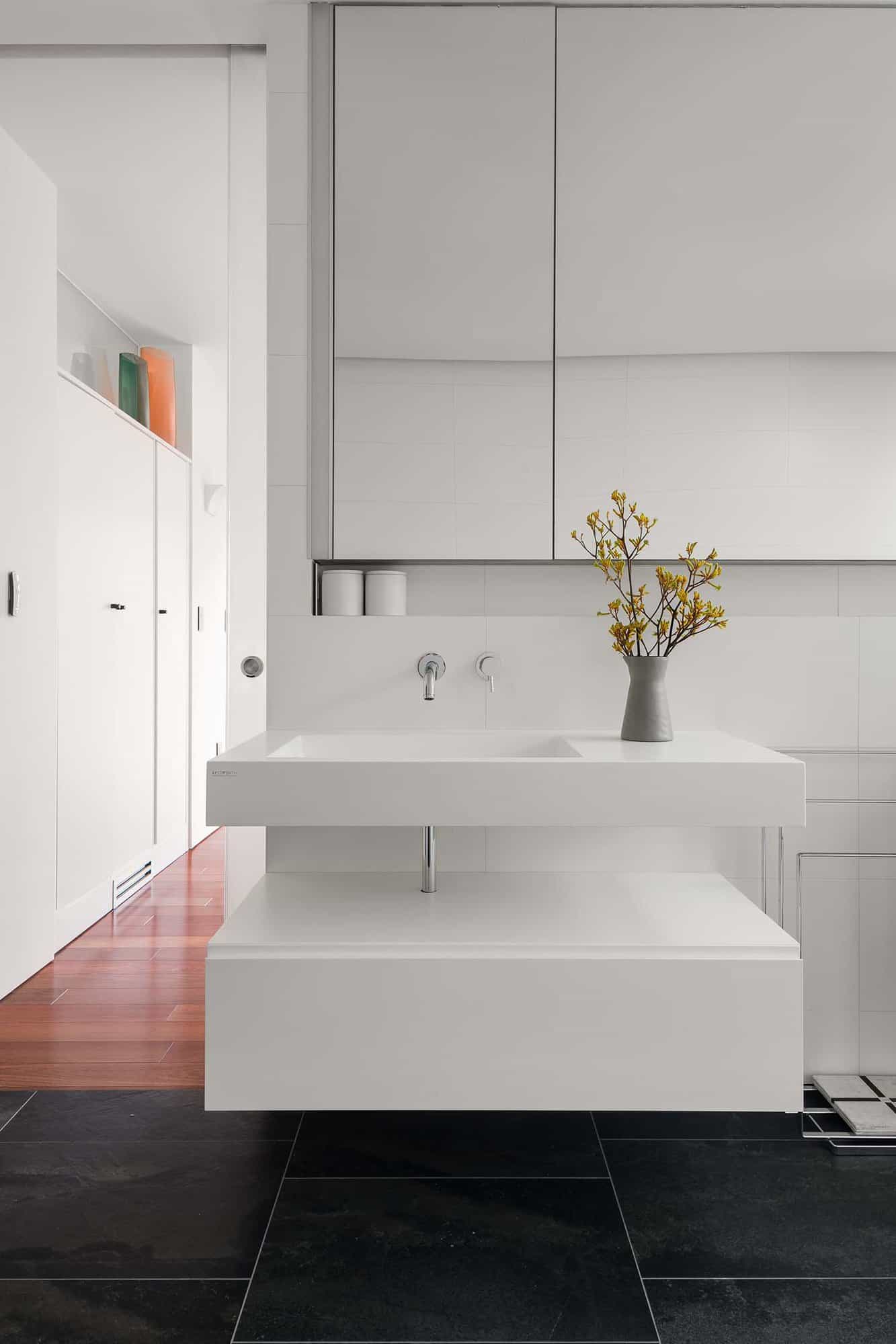 modern bathroom with a floating vanity