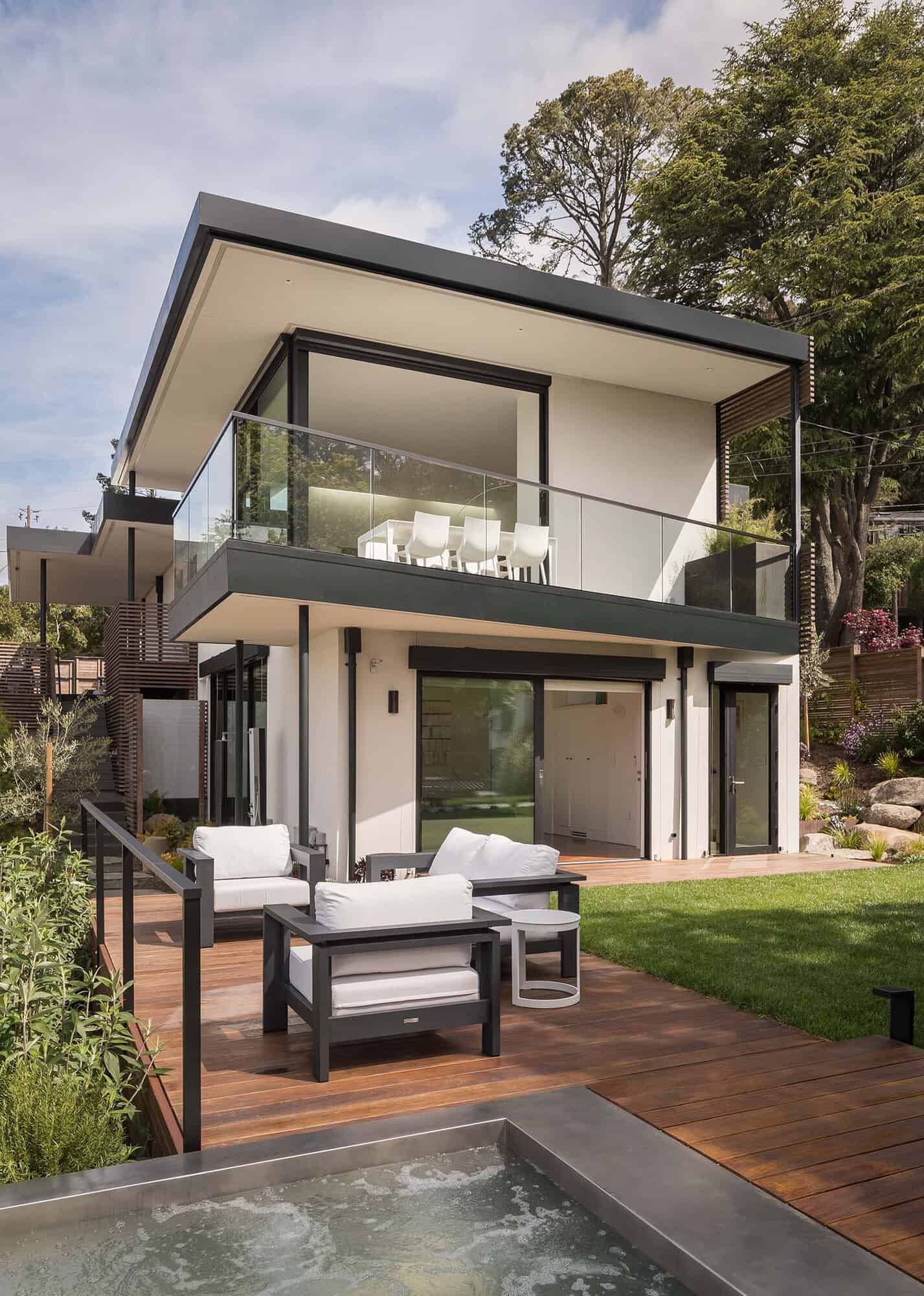 modern European style home exterior with a patio and outdoor furniture