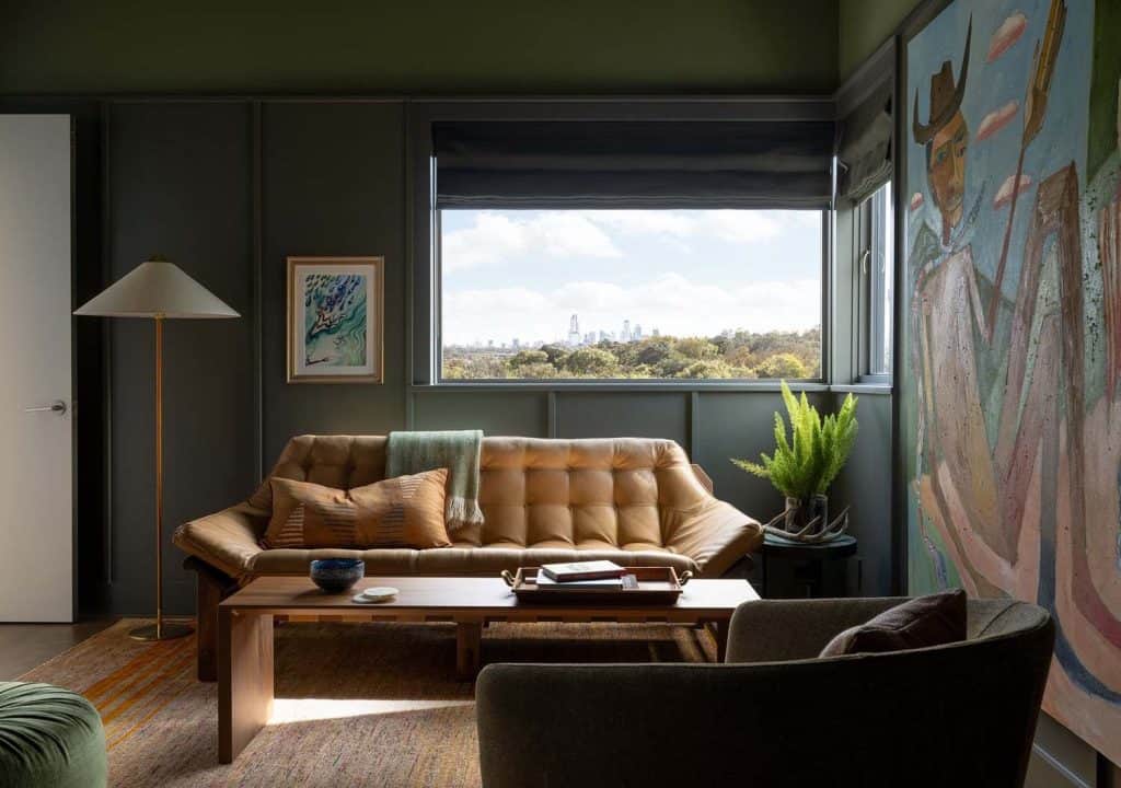 Majestic oak trees define a serene hillside home with Austin skyline views
