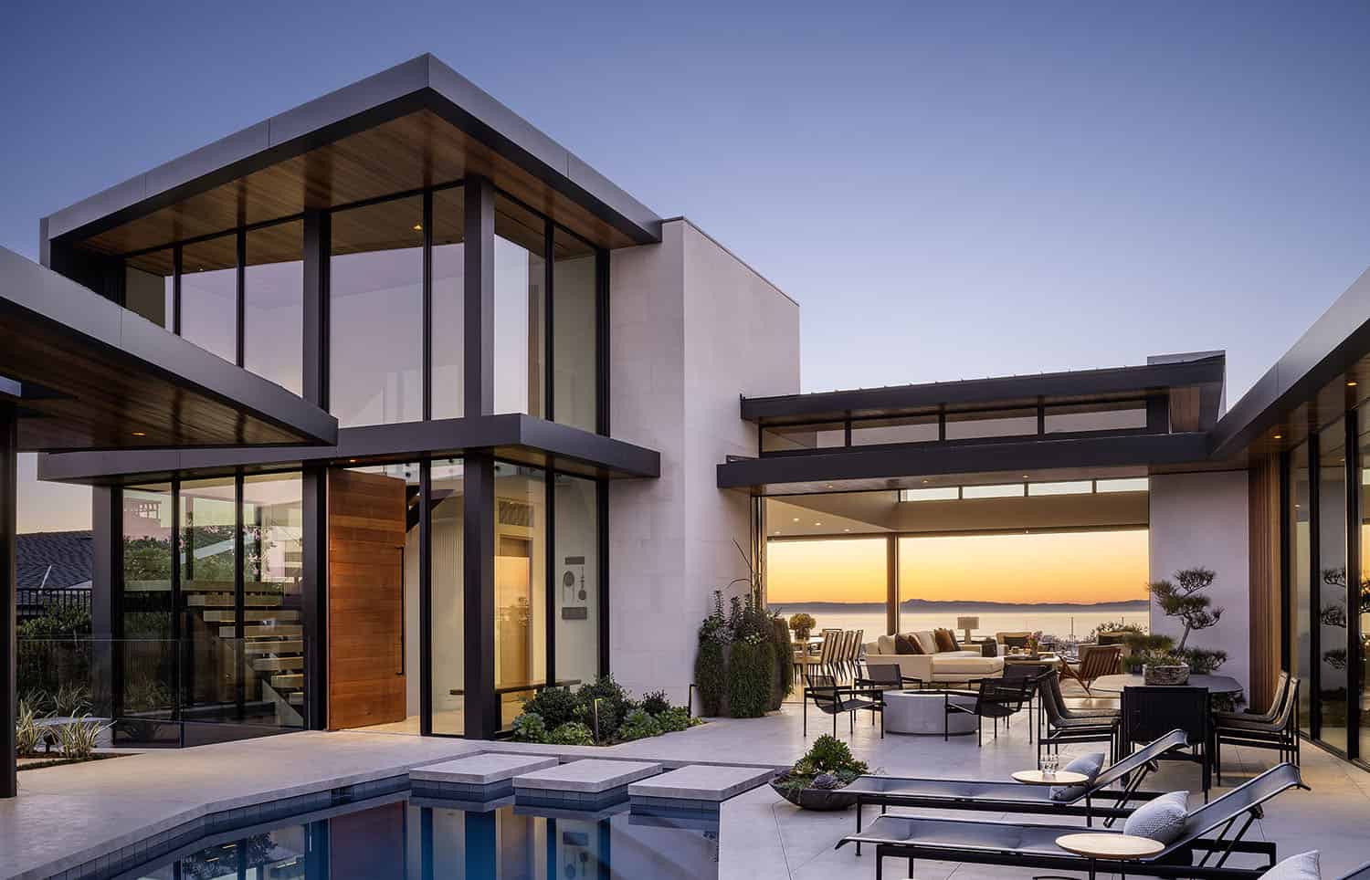 contemporary beach house exterior with a pool