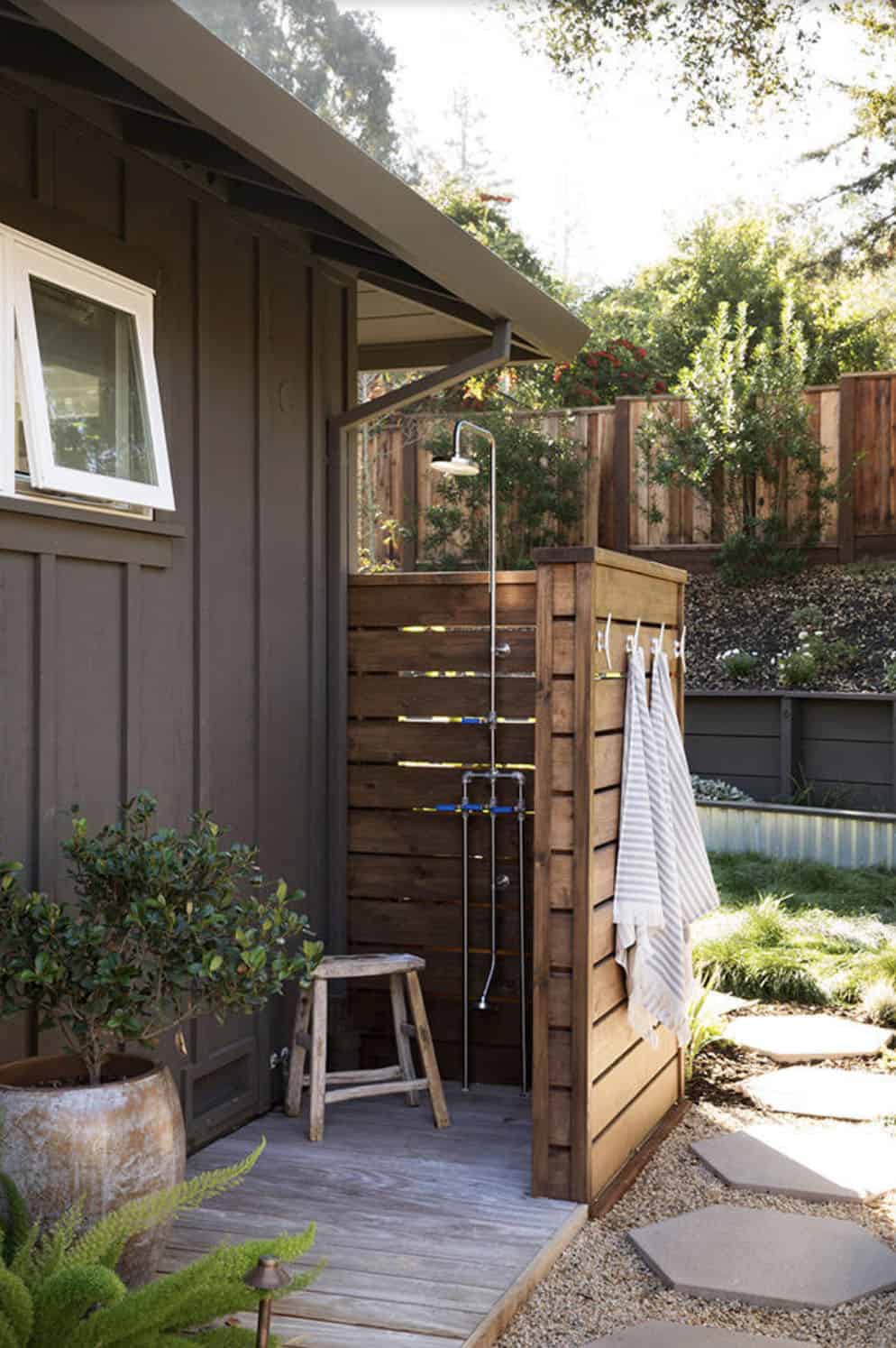 outdoor shower with a cedar privacy wall