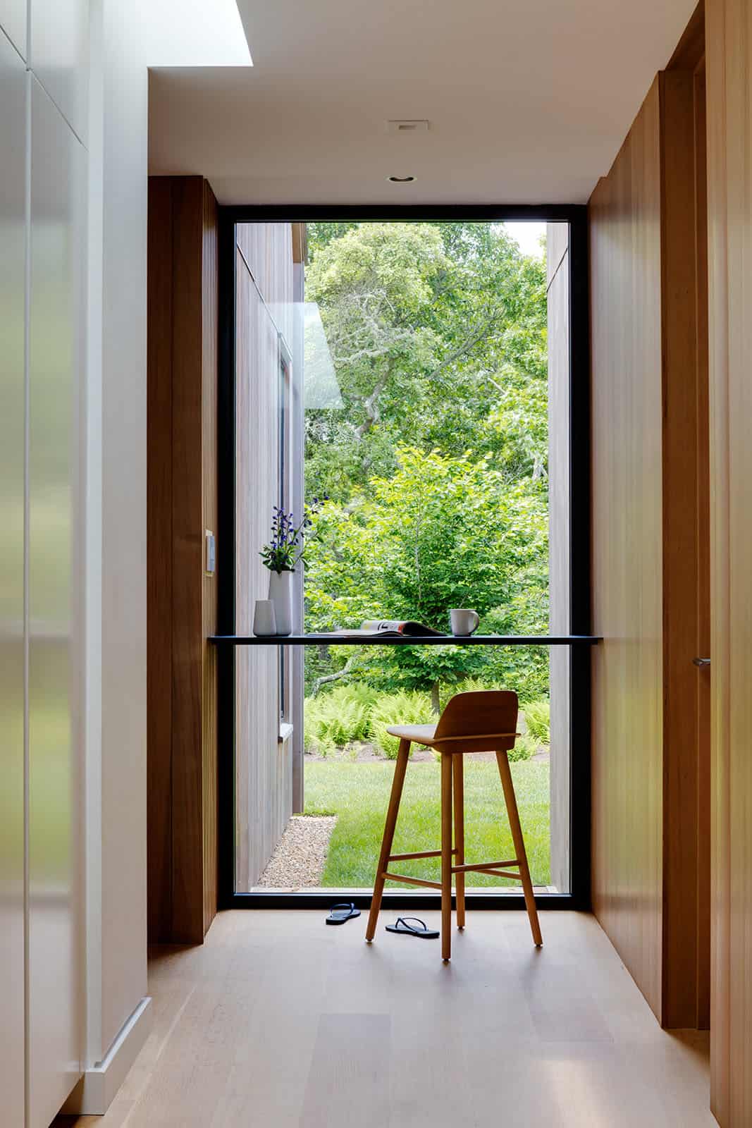 modern workstation with a floor-to-ceiling window