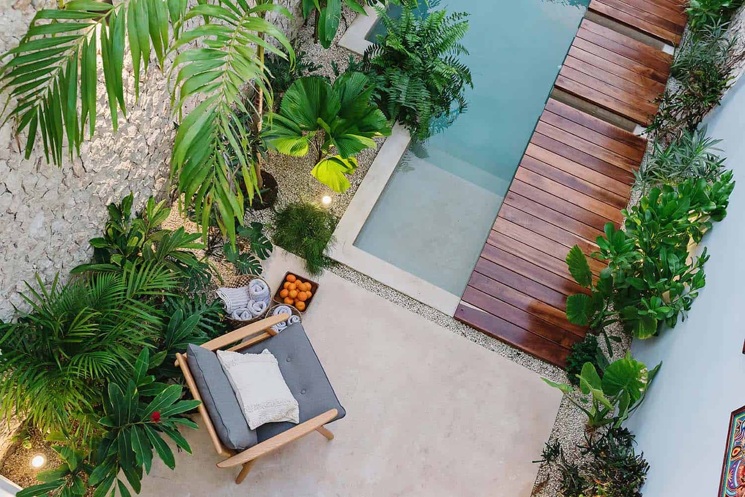 tropical small house exterior courtyard with a plunge pool aerial view