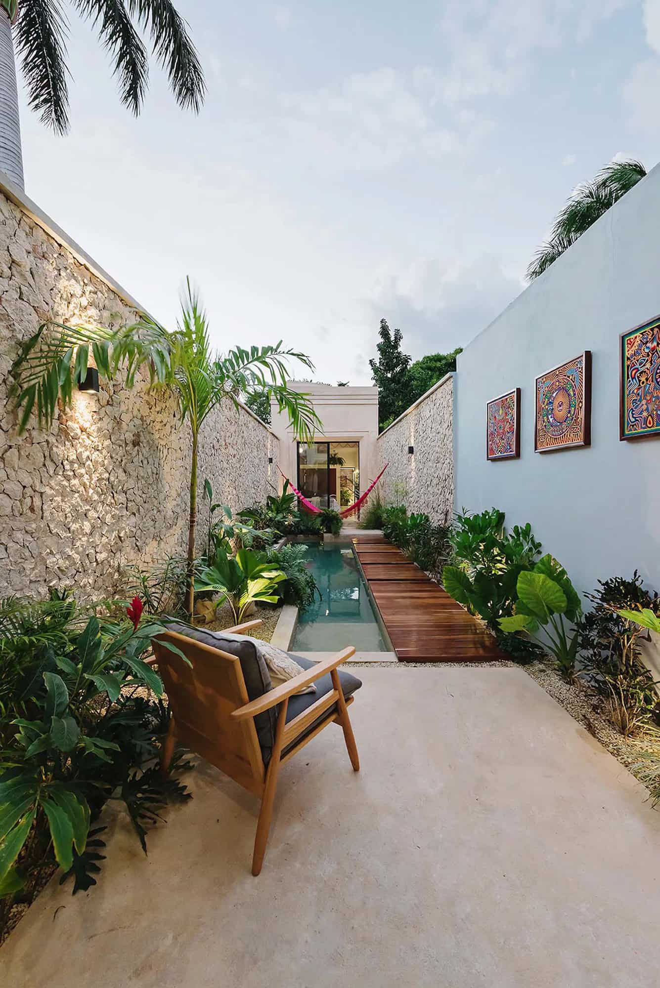 tropical small house exterior courtyard with a plunge pool