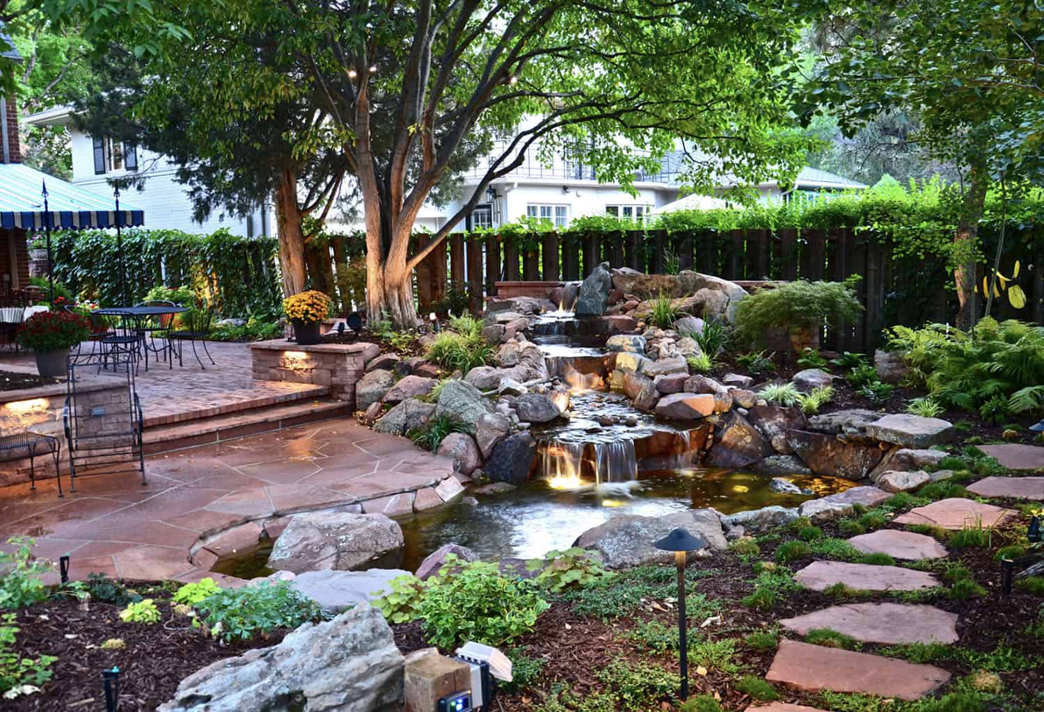 backyard with a rock waterfall