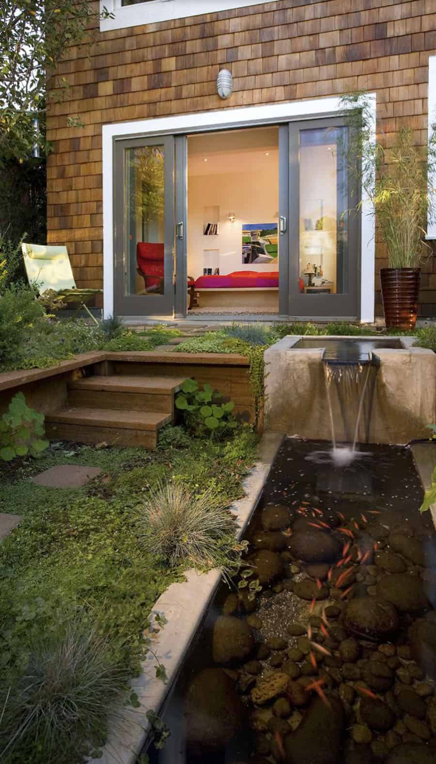 modern architecture in the garden with a waterfall into a koi pond