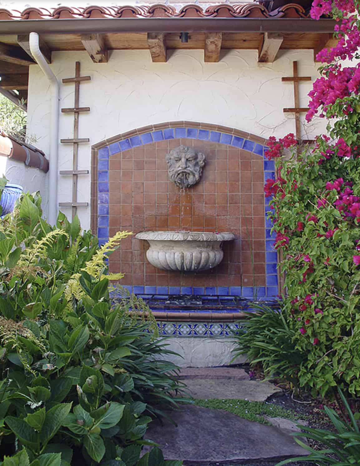 Spanish-style fountain in the entry forecourt
