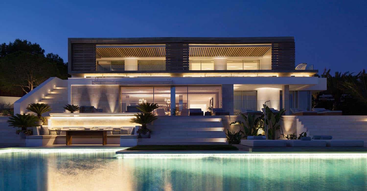 contemporary-mediterranean-villa-exterior-with-a-pool-at-dusk