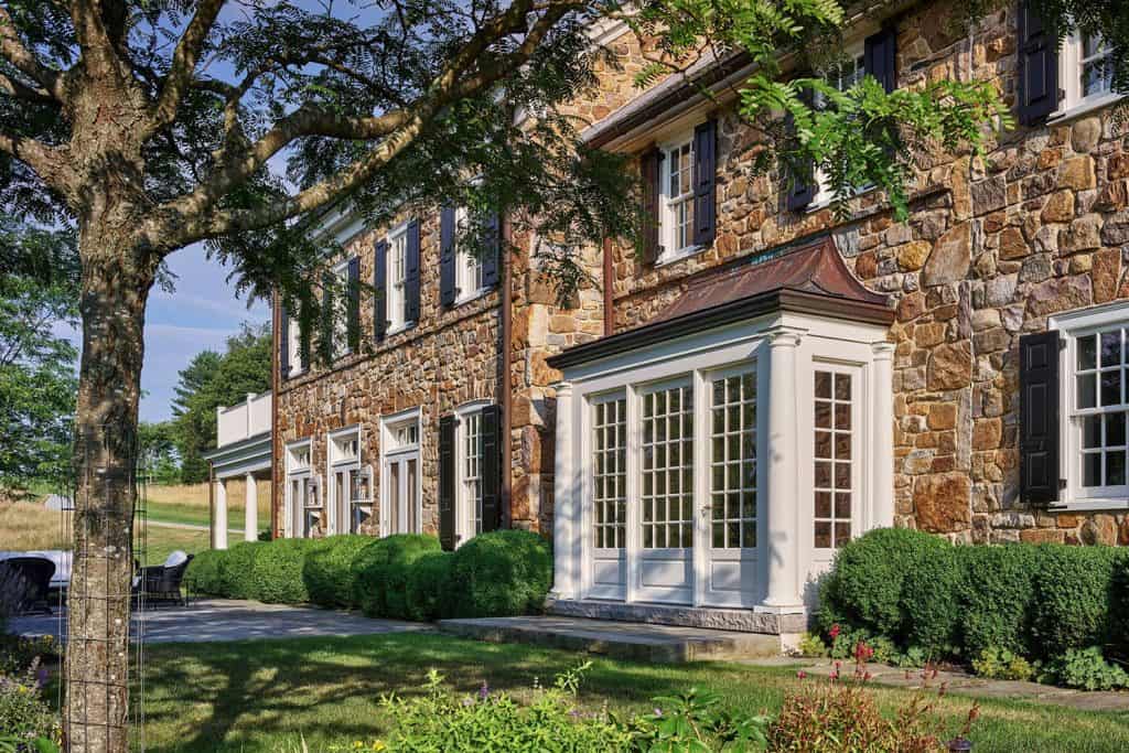 Explore this stunning Pennsylvania stone farmhouse with a timeless charm
