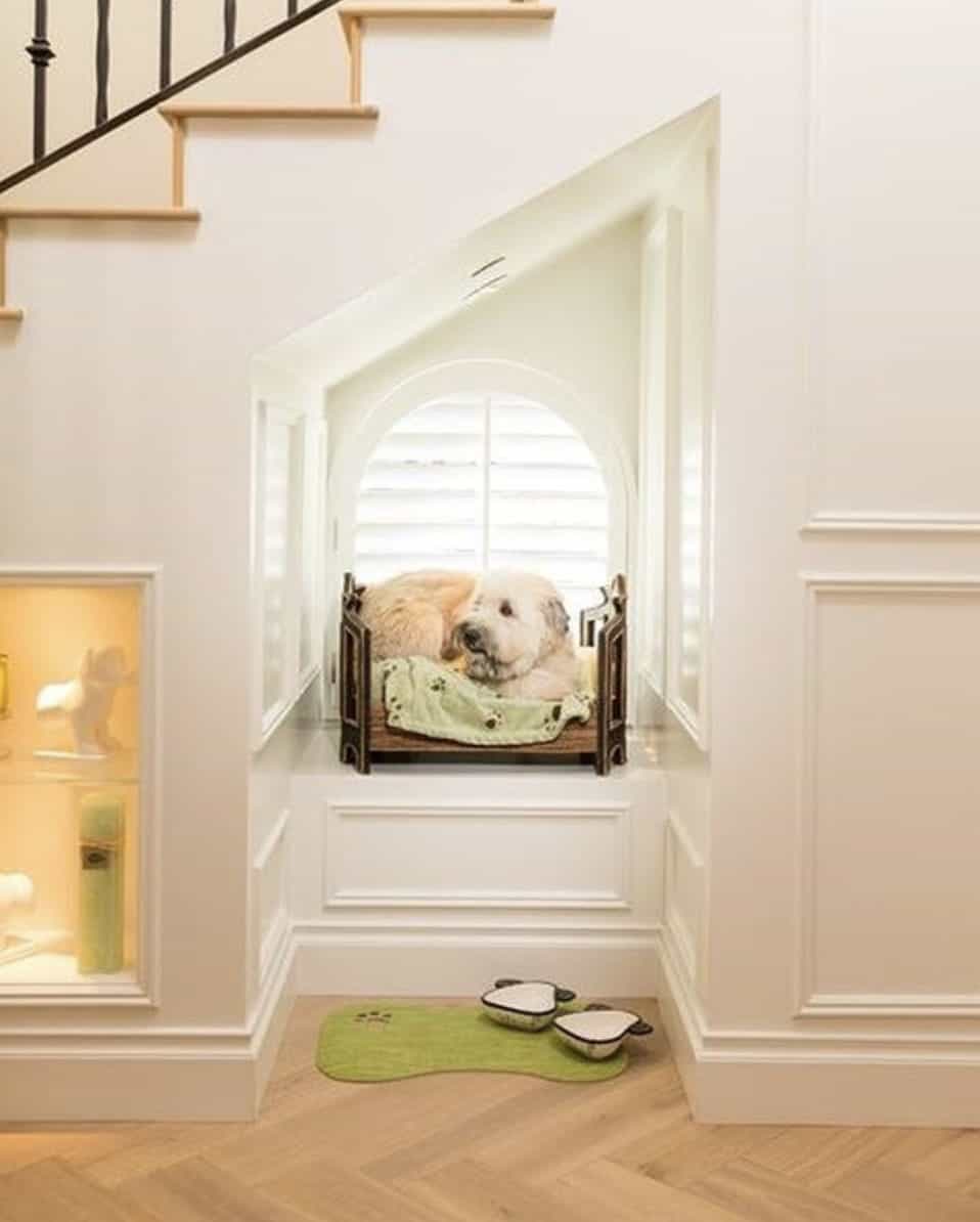 dog-bed-under-the-staircase-wtih-a-window-and-toy-storage