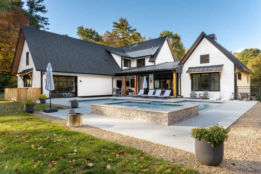 custom-modern-farmhouse-exterior-with-a-pool
