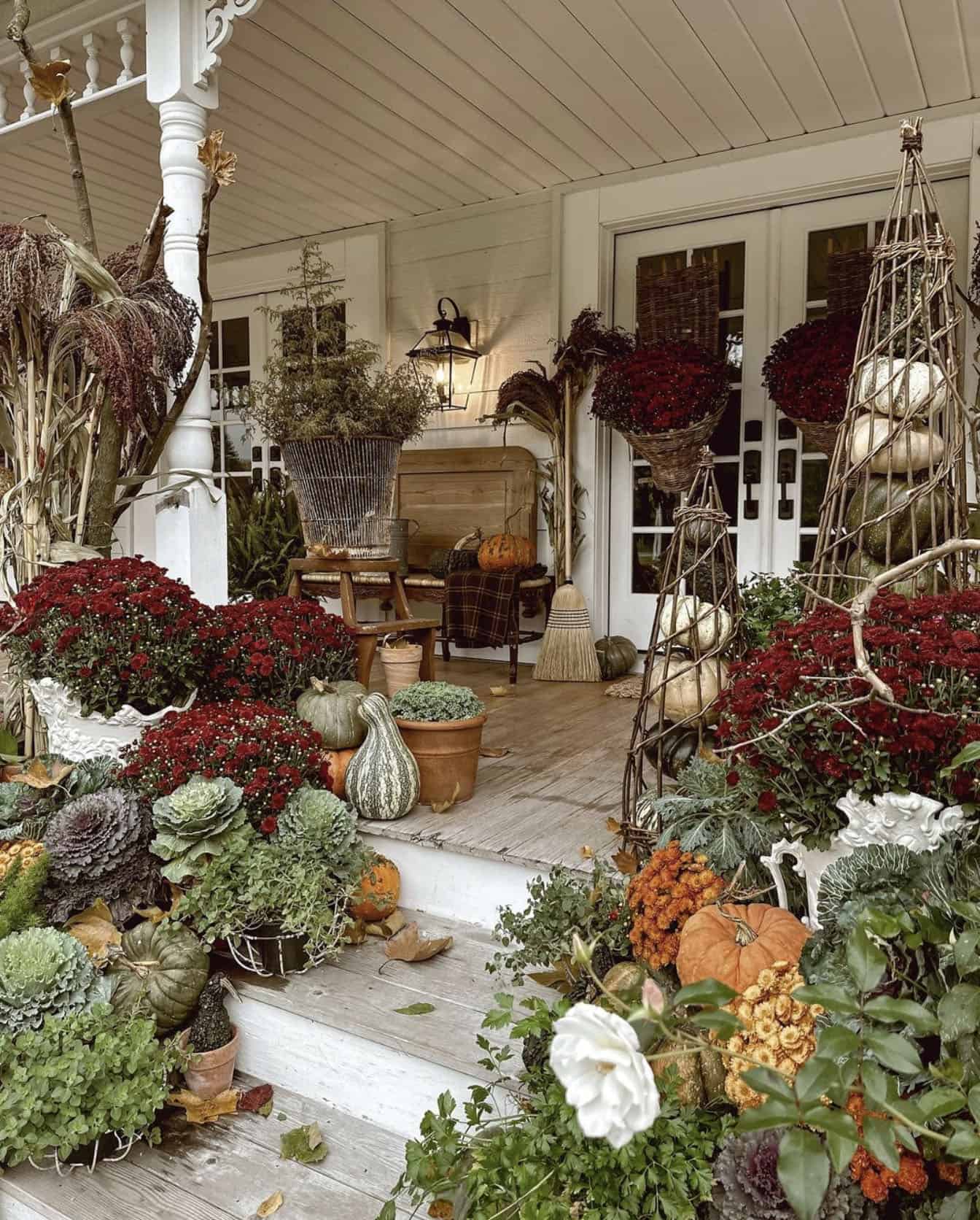 fall-front-entryway-with-pumpkins-gourds-kale-and-mums