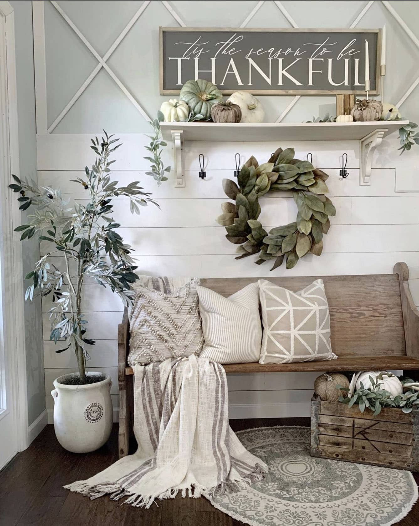 farmhouse-style-entry-with-an-antique-church-pew-fall-wreath-and-fall-sign