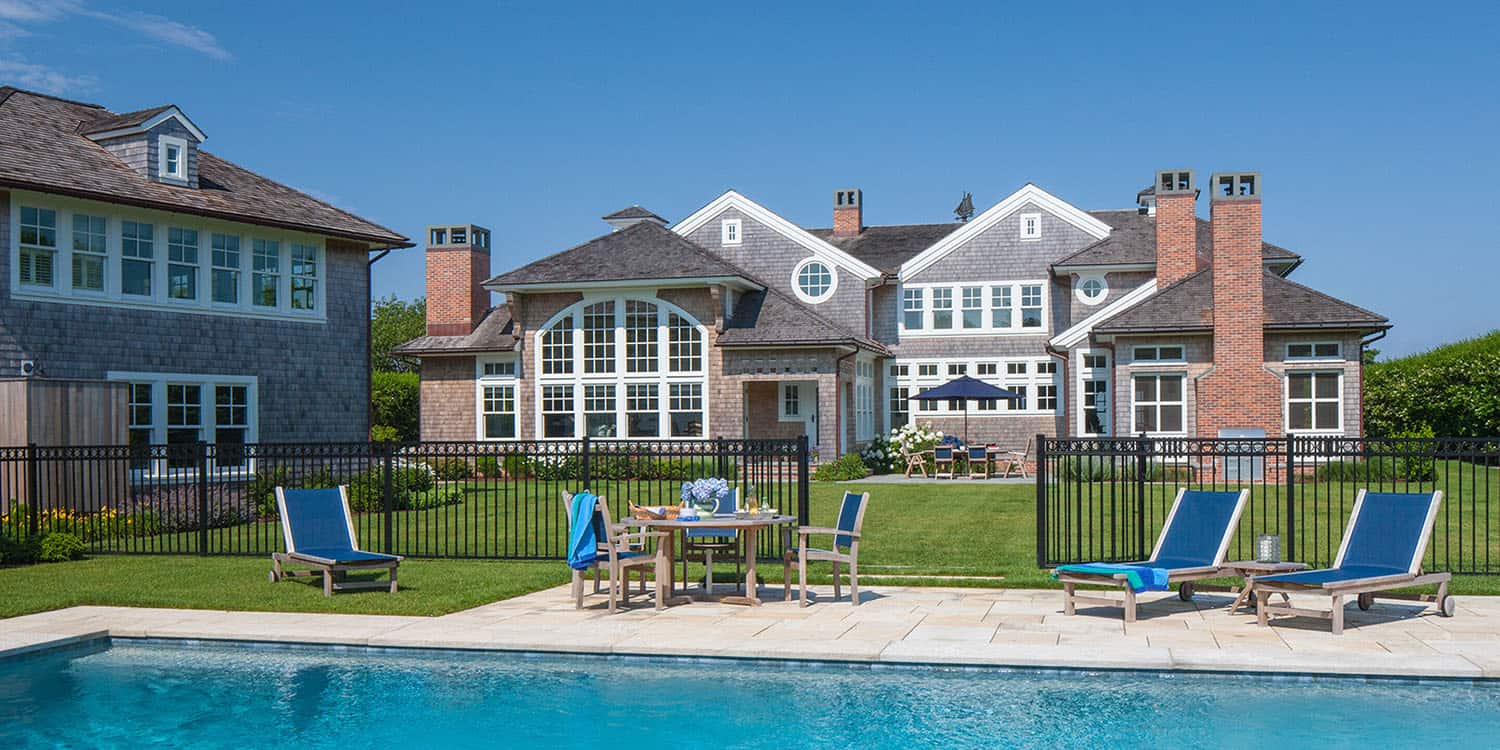 coastal-style-home-exterior-with-a-pool