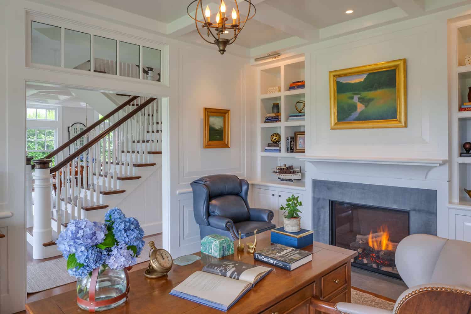 beach-style-home-office-with-a-fireplace