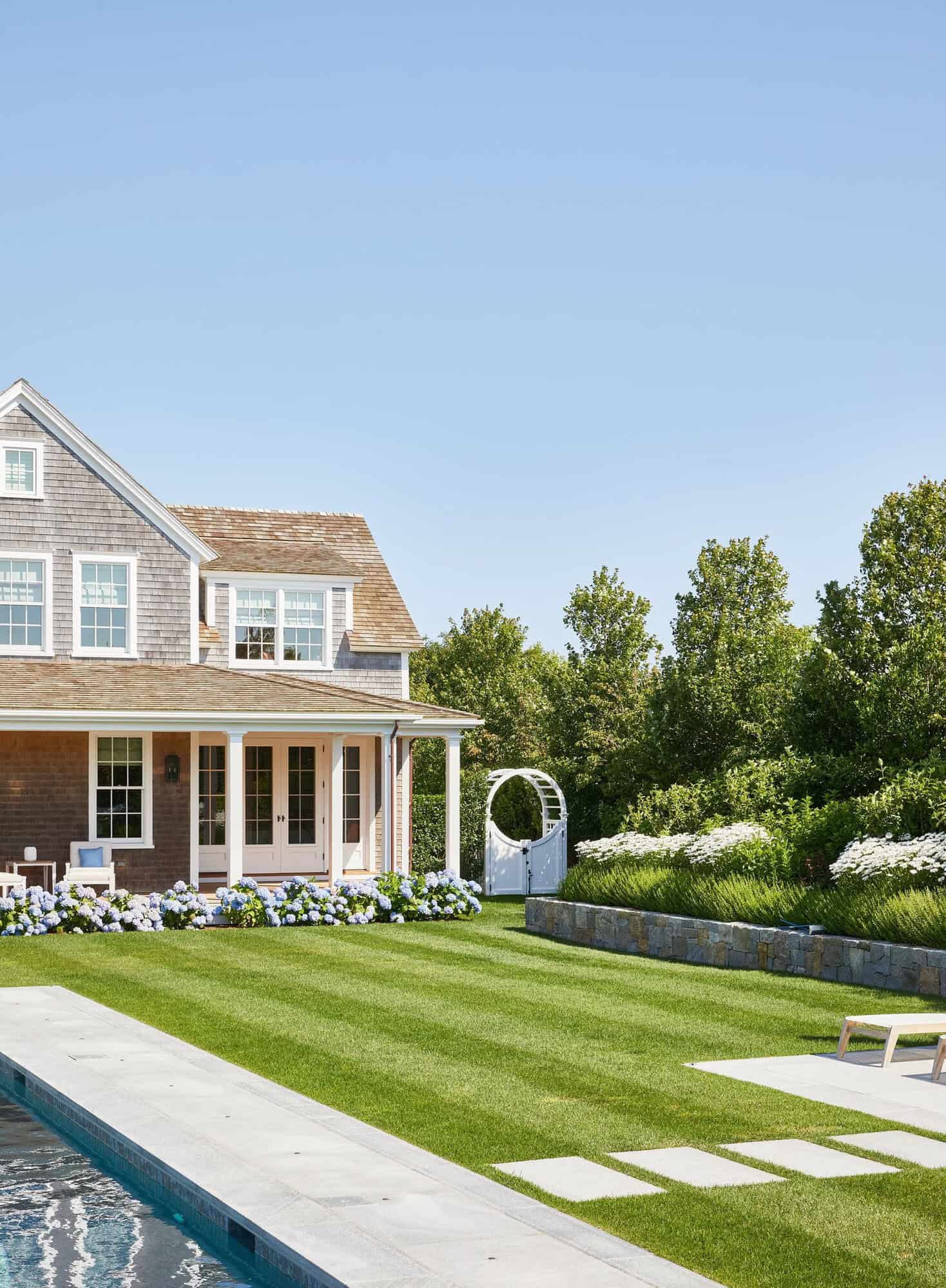 nantucket-beach-house-exterior-backyard-view-with-a-pool