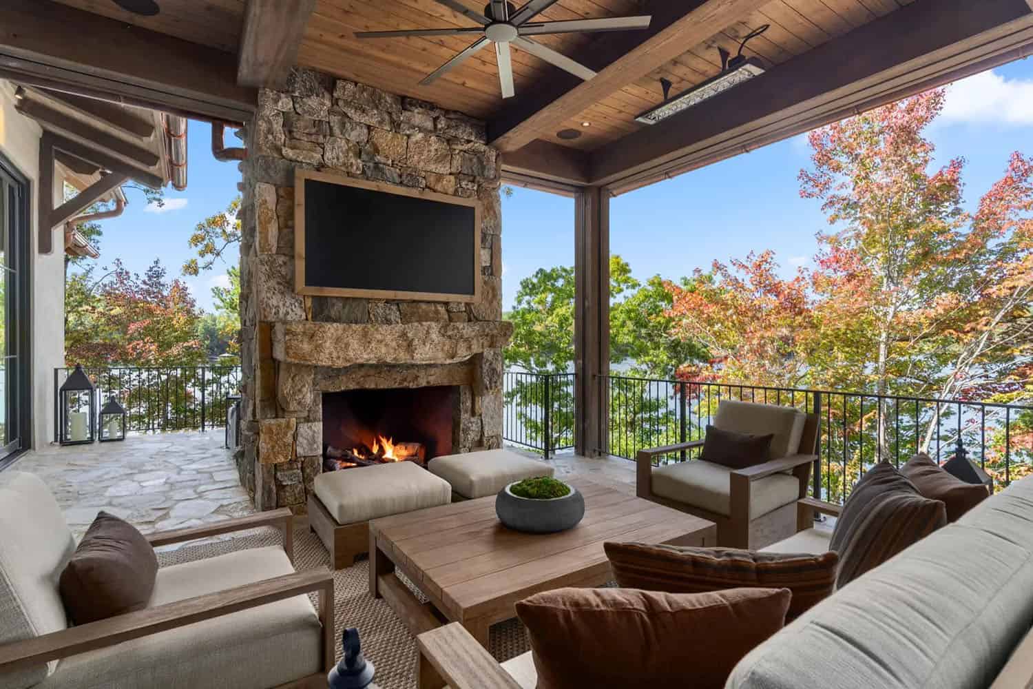 rustic-modern-covered-patio-with-outdoor-furniture-and-a-fireplace