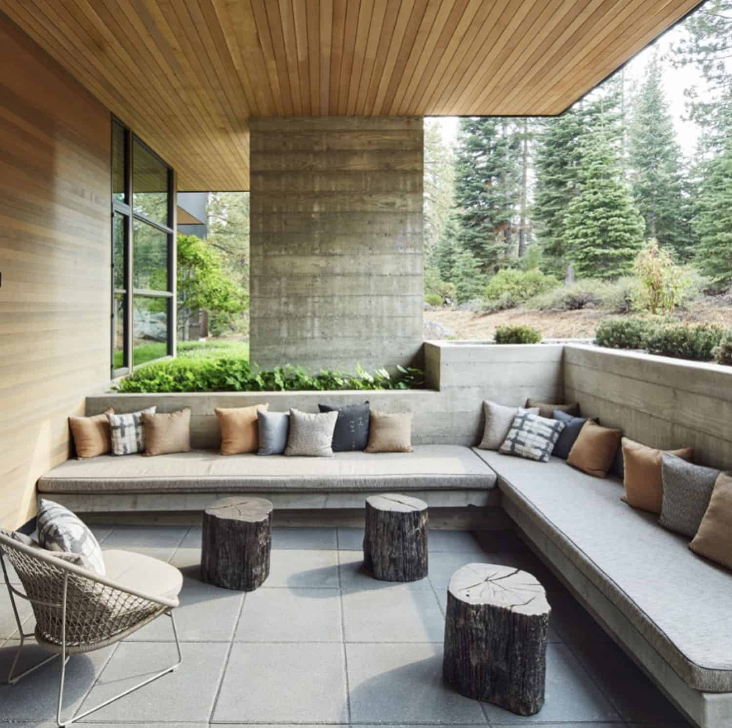 modern-mountain-home-covered-patio-with-built-in-bench-seating