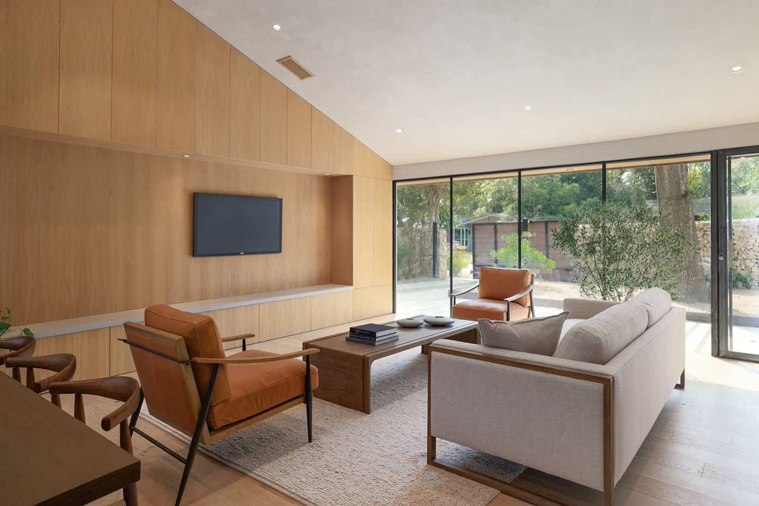 mid-century-modern-living-room-with-pocketing-sliding-glass-doors