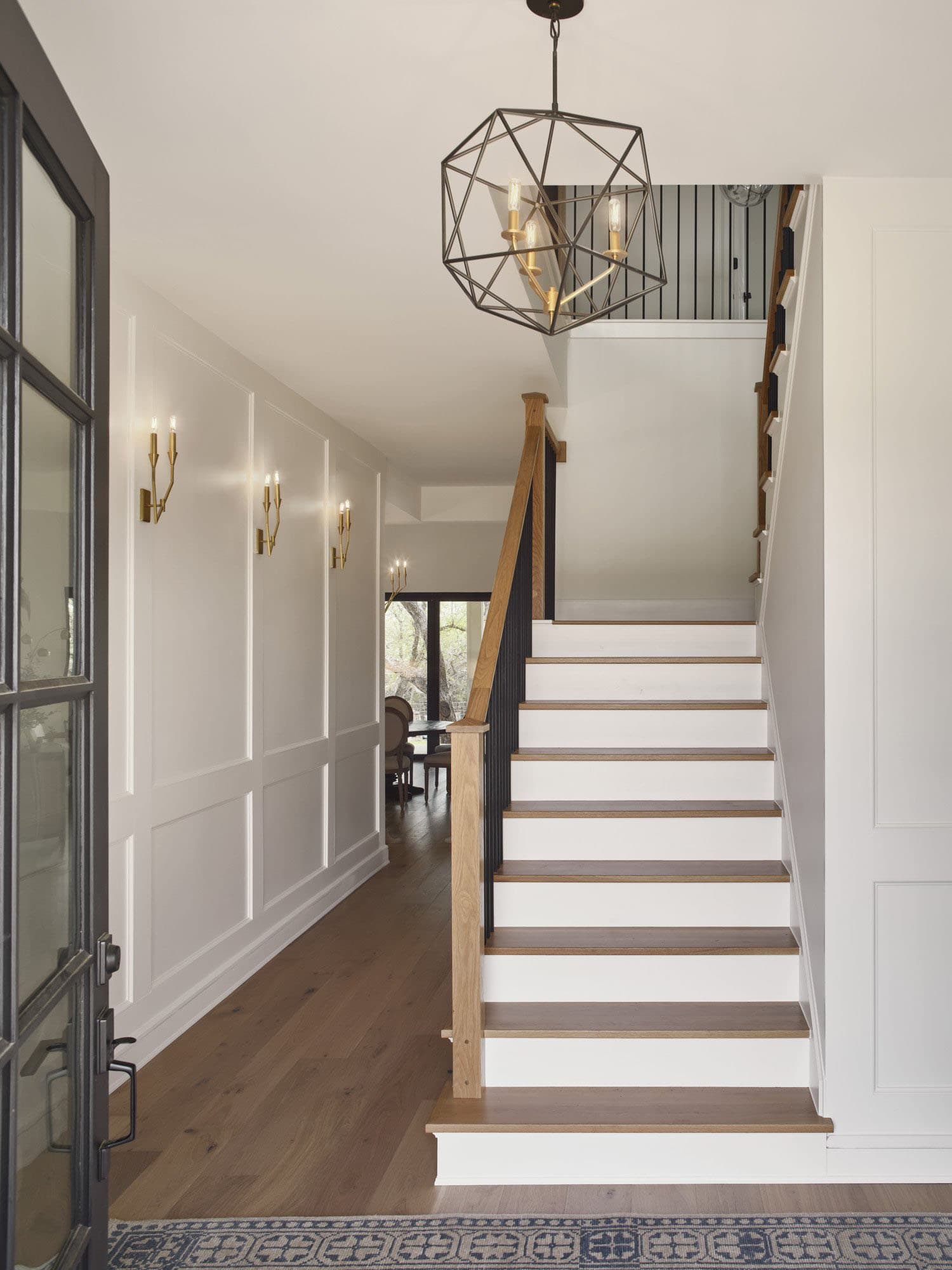 traditional-style-home-entry-with-a-staircase