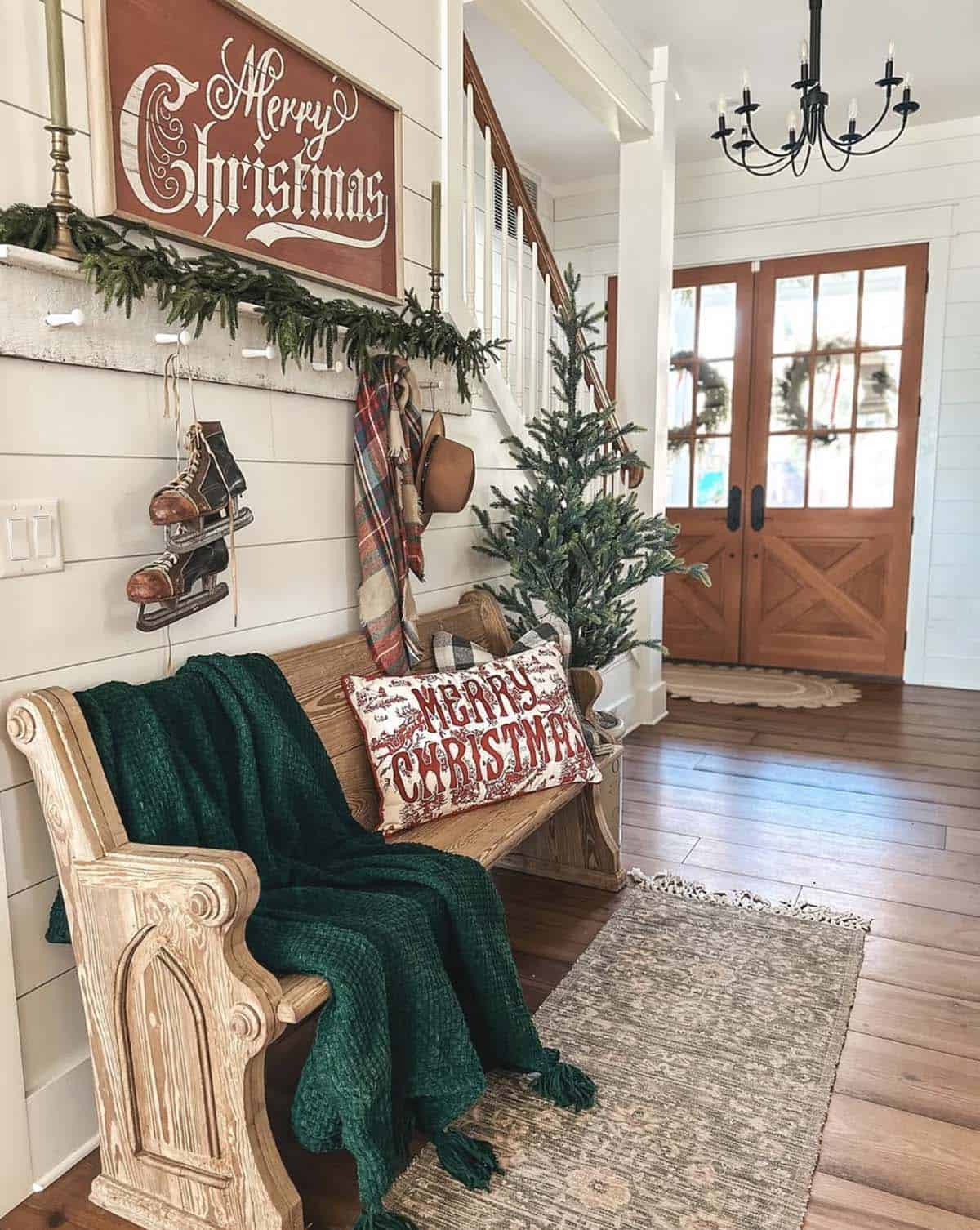 farmhouse style christmas decorated entry