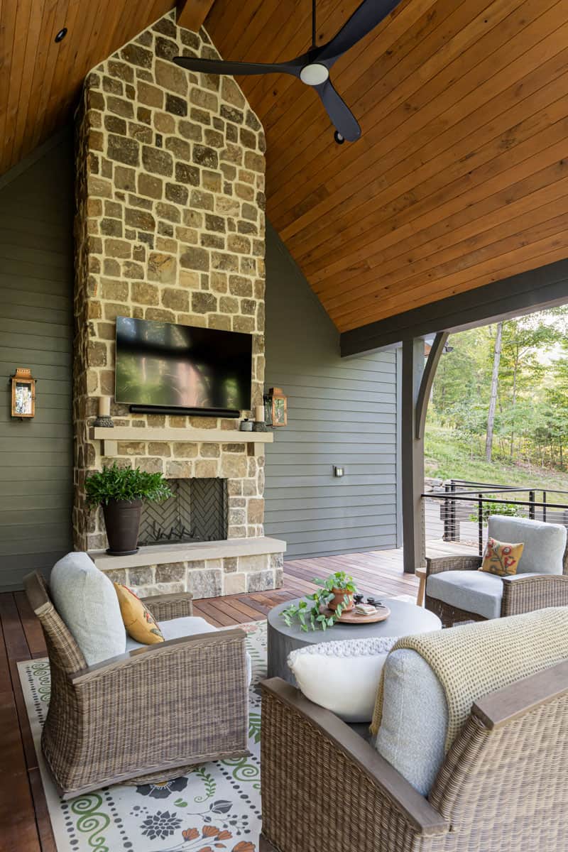 european-inspired-mountain-home-with-a-covered-porch-and-fireplace