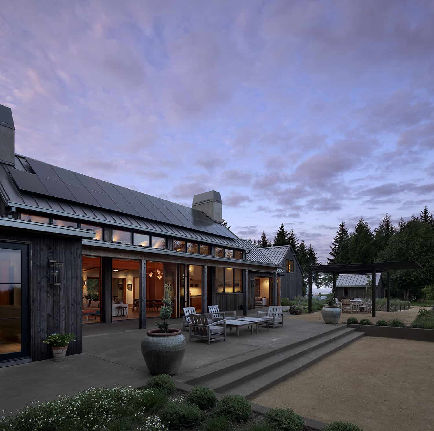 barn-inspired-home-exterior-at-dusk