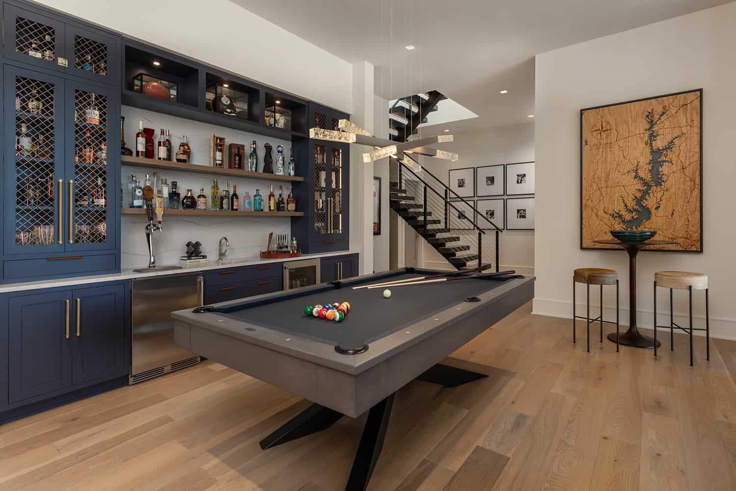 contemporary-game-room-with-a-pool-table-and-home-bar