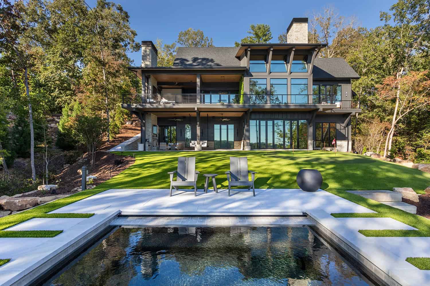 contemporary-lake-house-exterior-with-a-pool