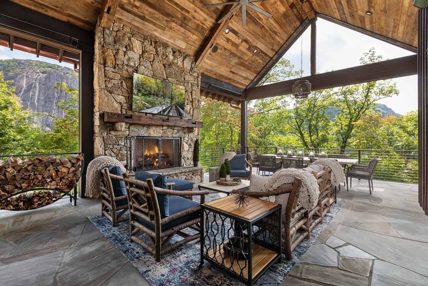 contemporary-covered-porch-with-outdoor-furniture-and-a-fireplace