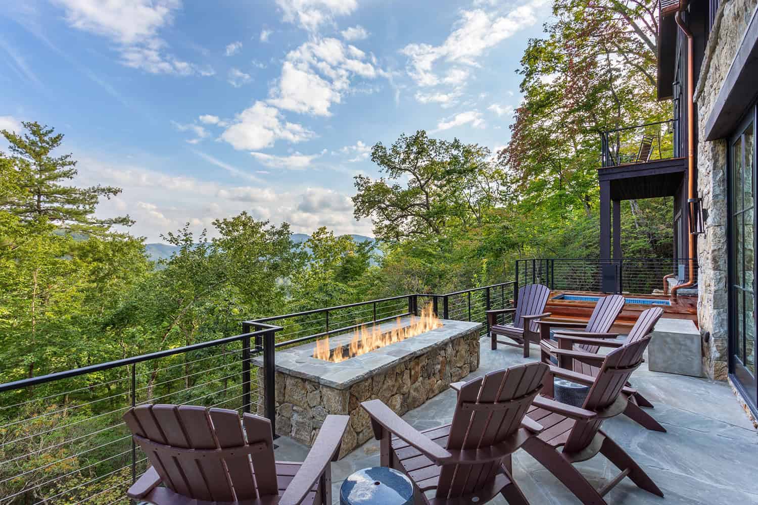 contemporary-mountain-home-patio-with-a-fire-pit