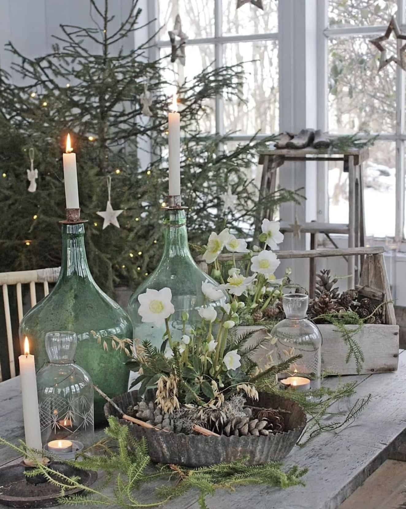 dining-table-with-glass-vases-filled-with-taper-candles