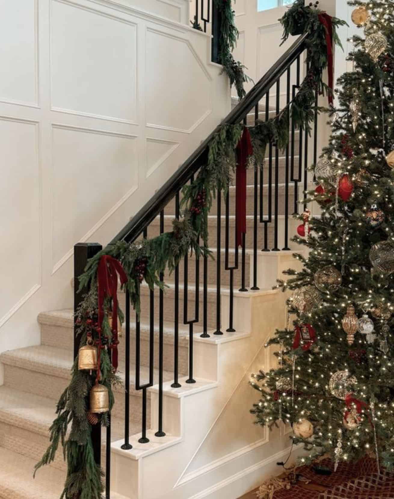 staircase-styled-for-christmas-with-garland