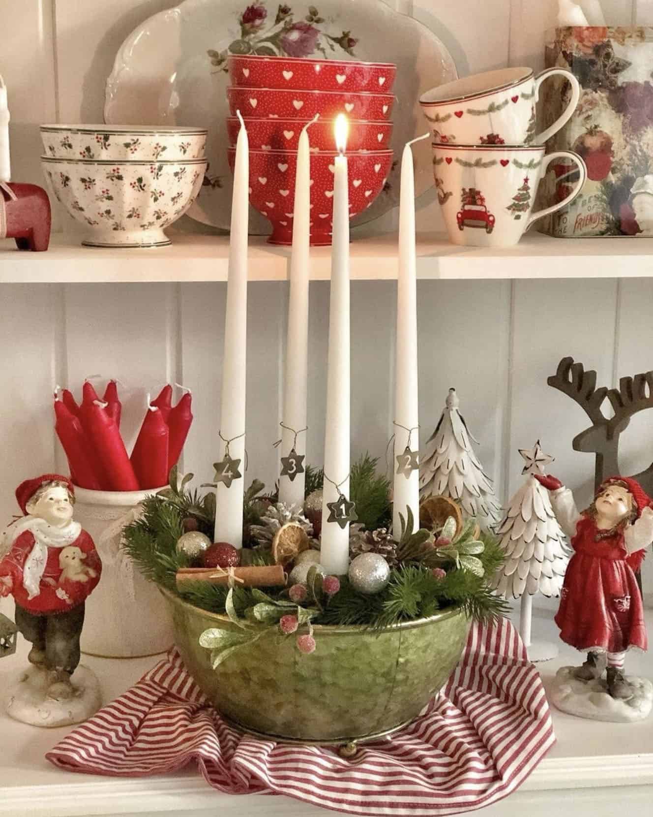 beautiful-christmas-vignette-with-candles-and-figurines