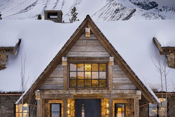 modern-rustic-mountain-home-exterior-with-snow