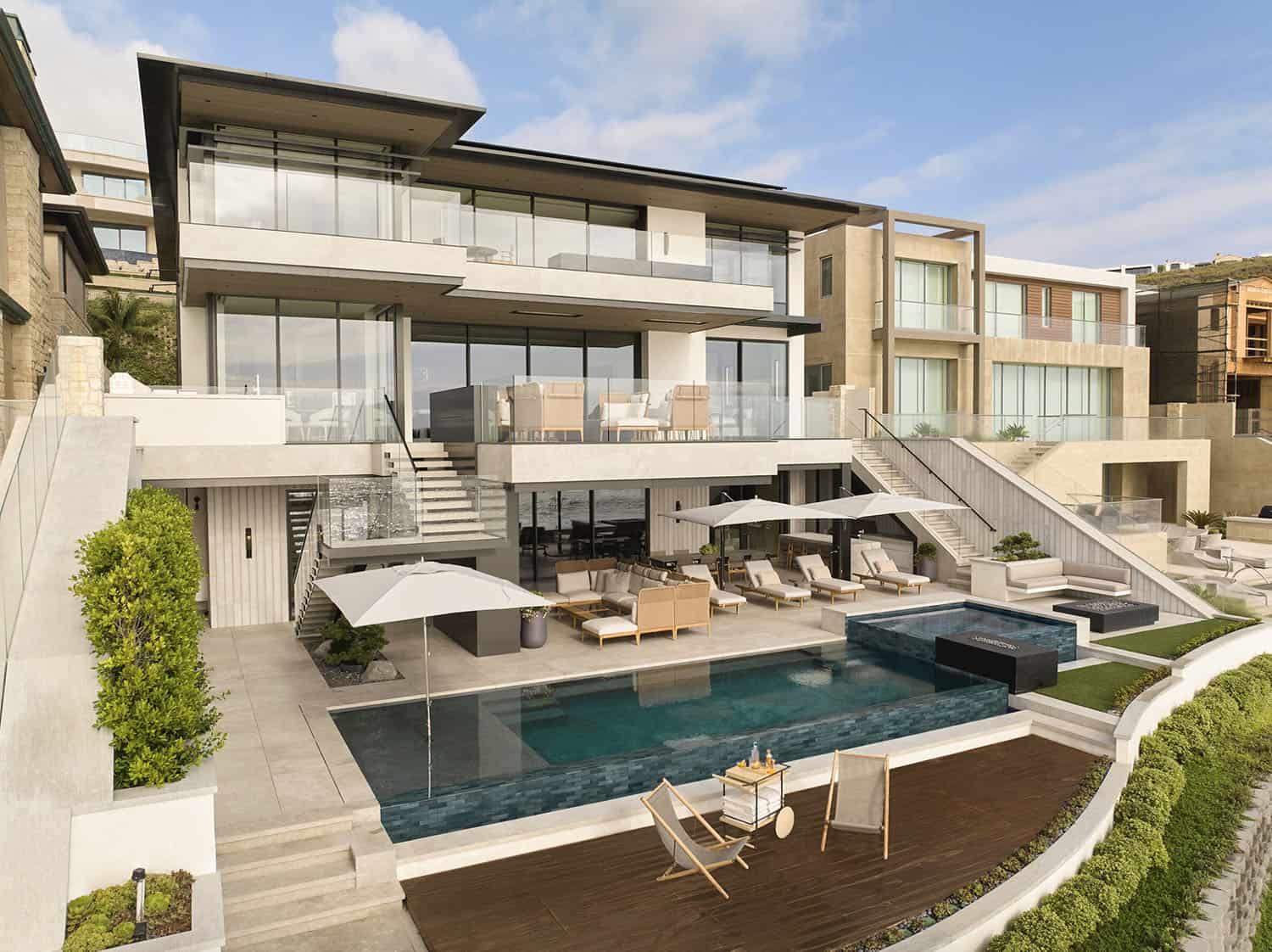 contemporary-home-exterior-with-a-pool