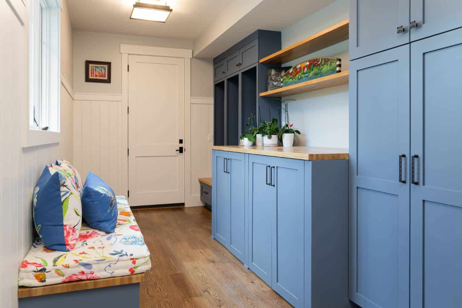 contemporary-craftsman-style-mudroom-with-a-bench-and-storage-cabinets