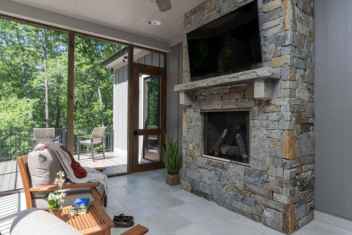 craftsman-style-mountain-home-screened-porch-with-a-fireplace