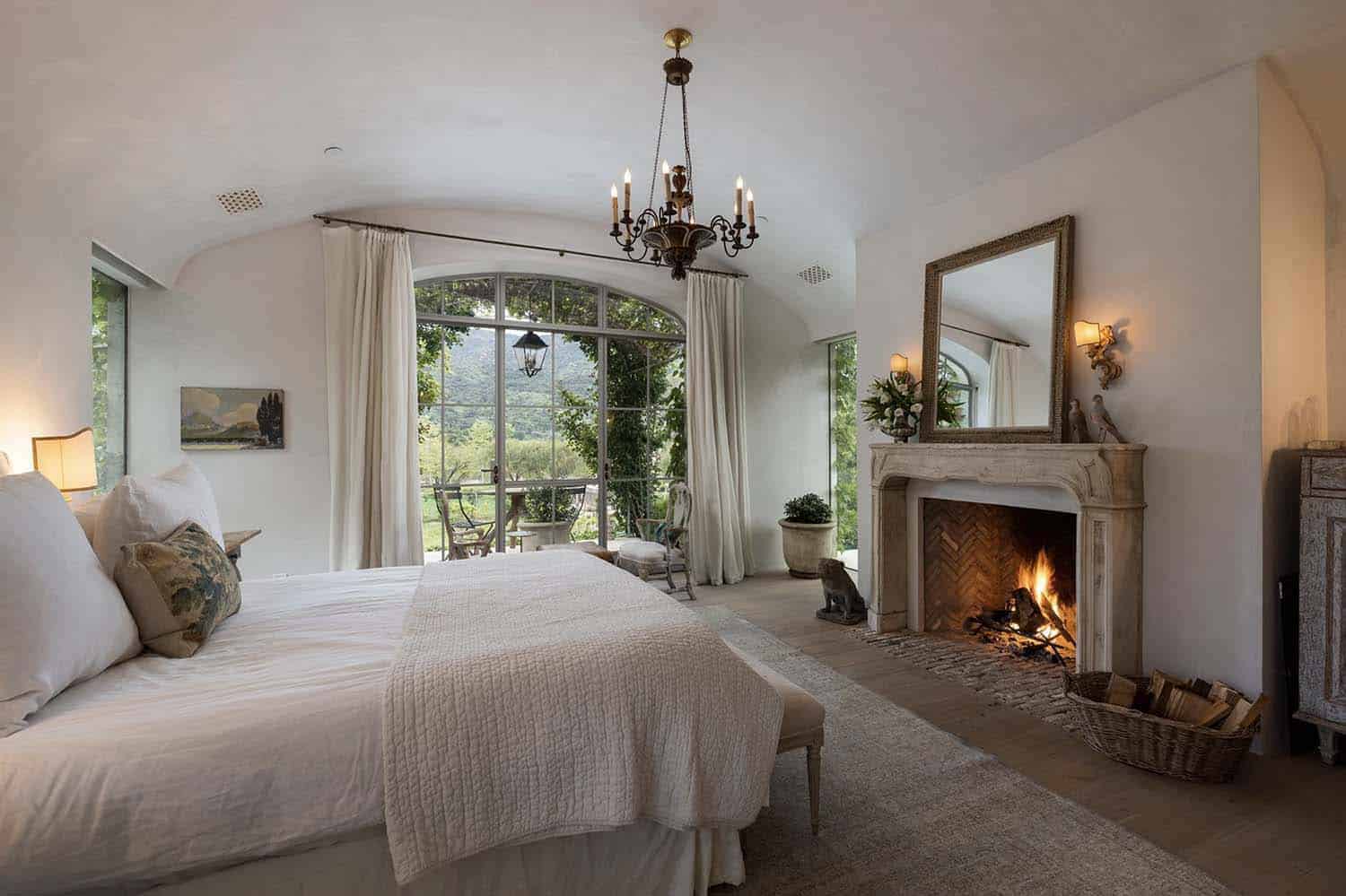 european-inspired-bedroom-with-a-fireplace