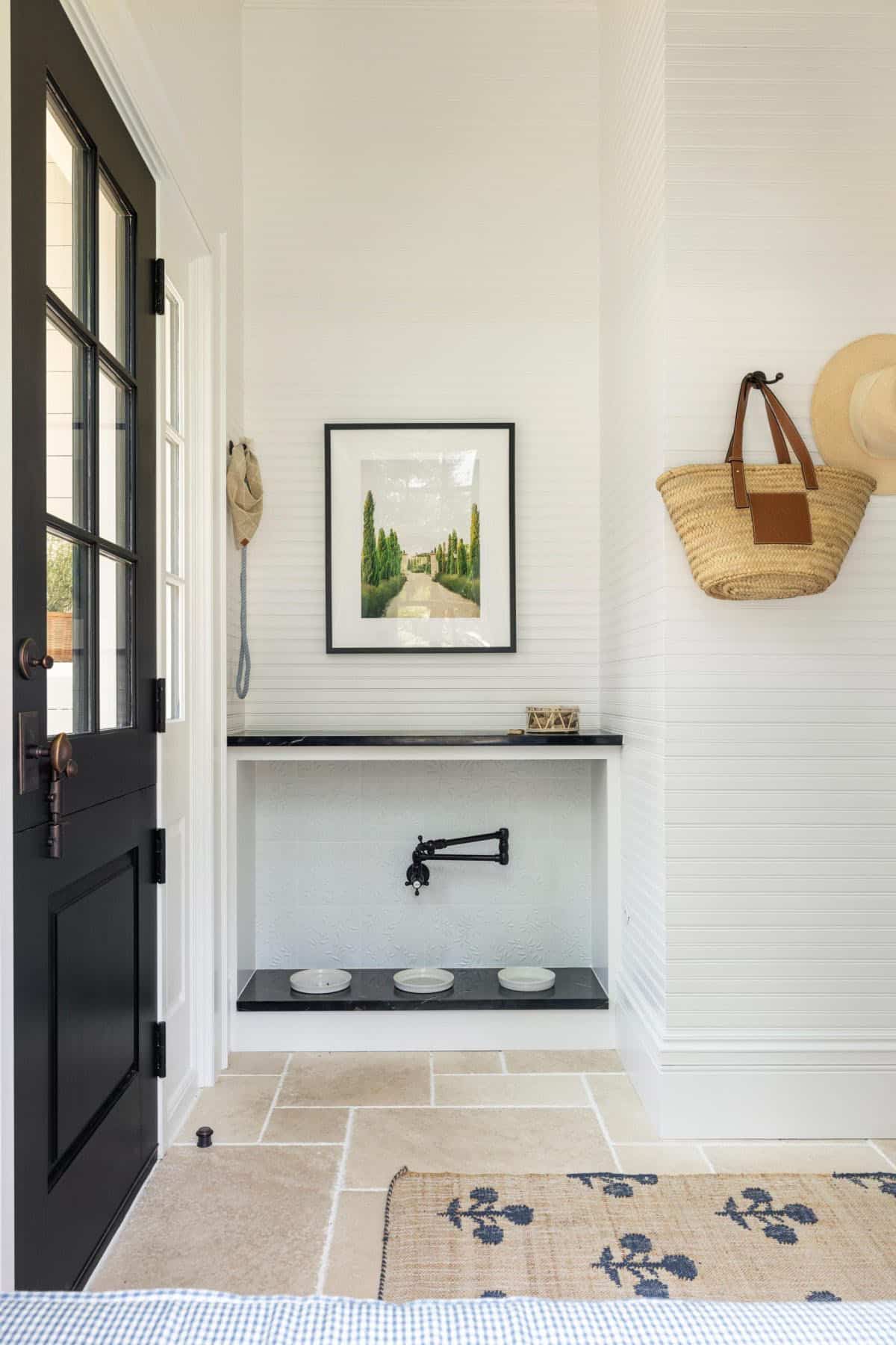 transitional-style-mudroom-with-a-built-in-dog-feeding-station