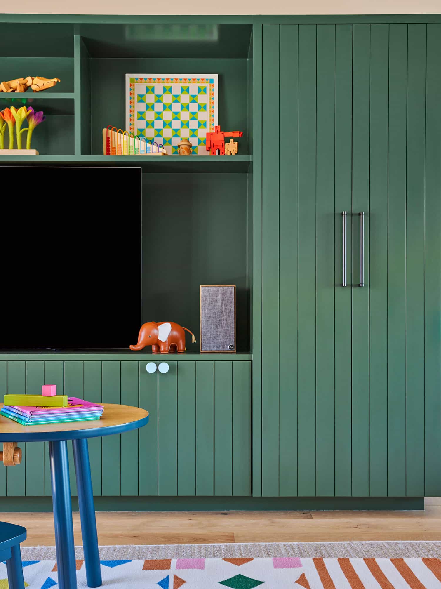 beach-style-kids-playroom-built-in-cabinets-painted-green