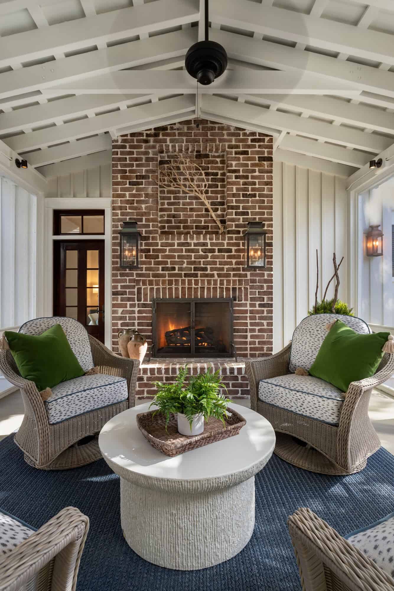 beach-style-sceened-porch-with-a-fireplace