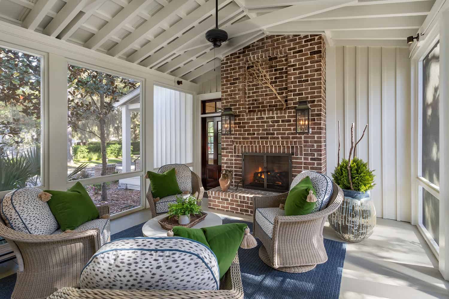 beach-style-sceened-porch-with-a-fireplace