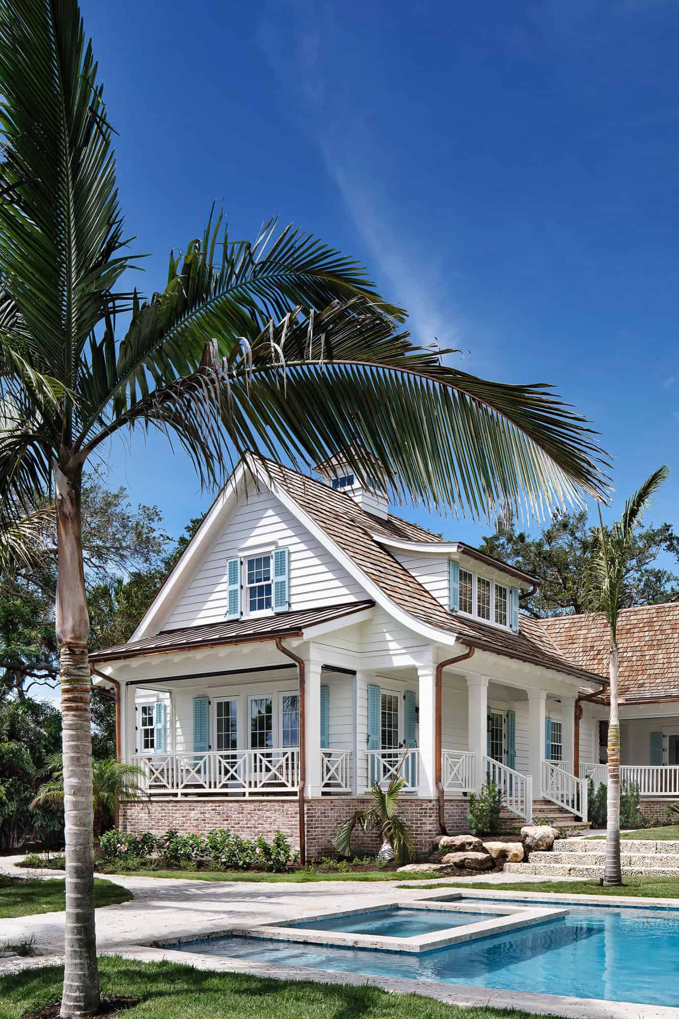 coastal-style-home-exterior-with-a-pool