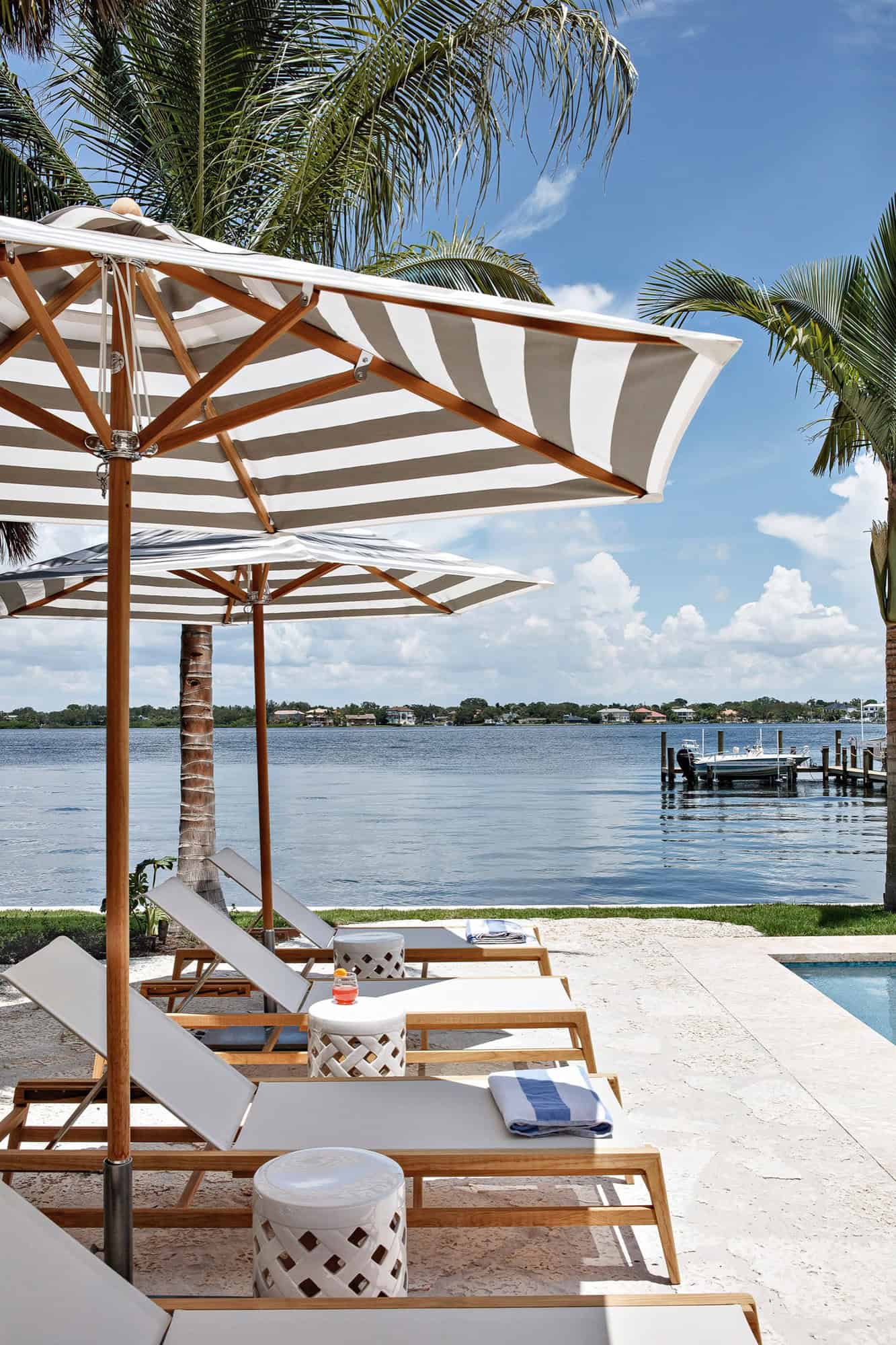 coastal-style-home-pool-with-chaise-lounges